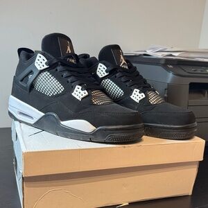 Men's Black and White jordan 4